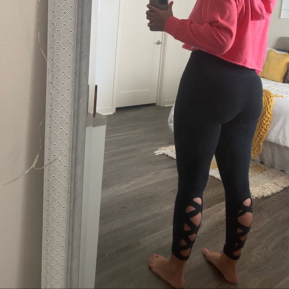 Black leggings with criss cross opening on back